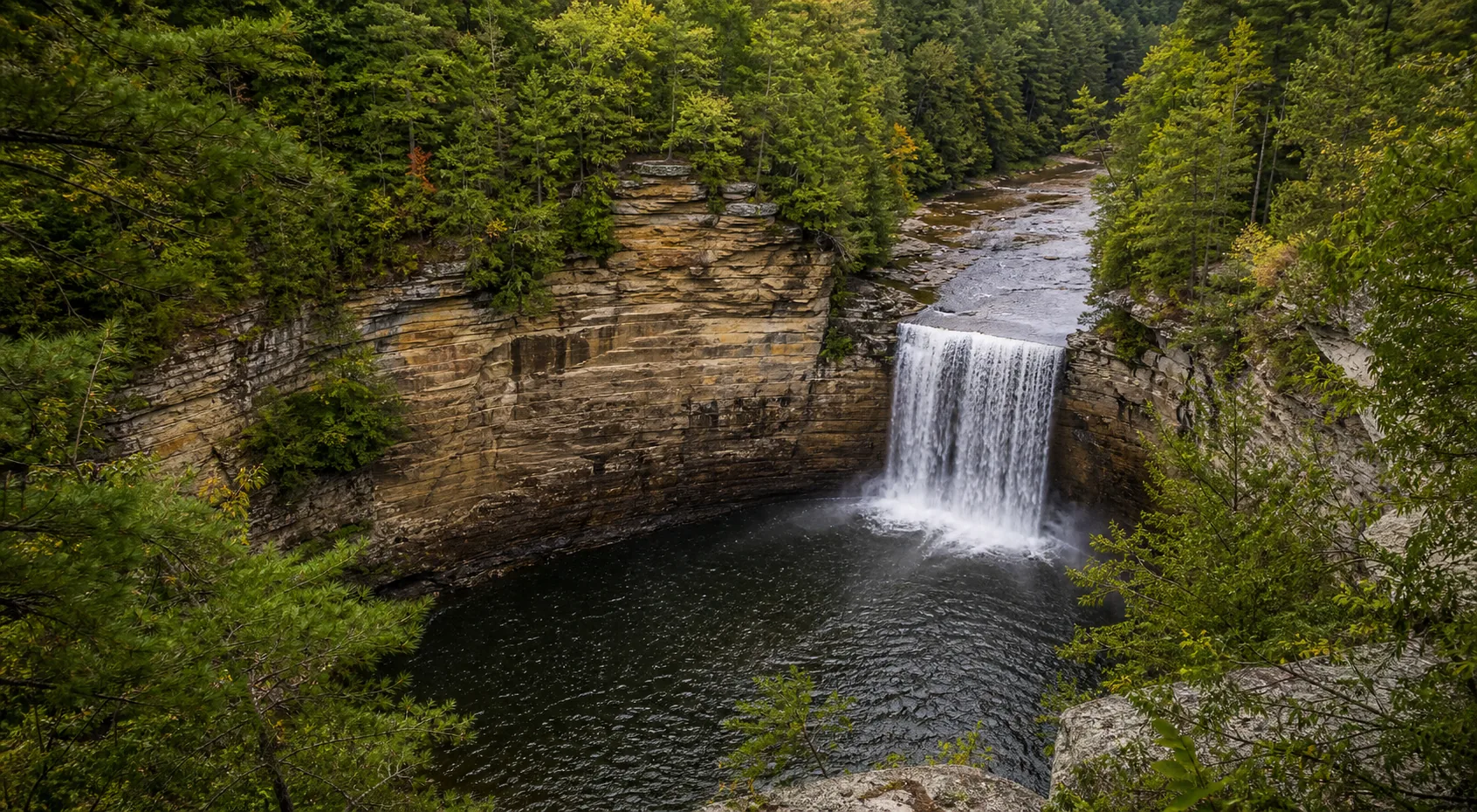 Cane Creek Falls wide gorge view from the nature center overlook with the 85-foot plunge anchoring the canyon wall