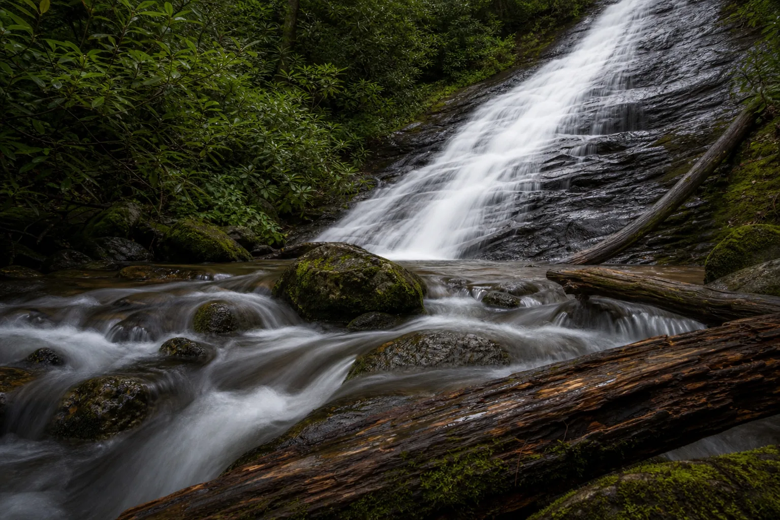 Detail of Helton Creek Falls water flowing over biotite gneiss and mica schist of the southern Blue Ridge