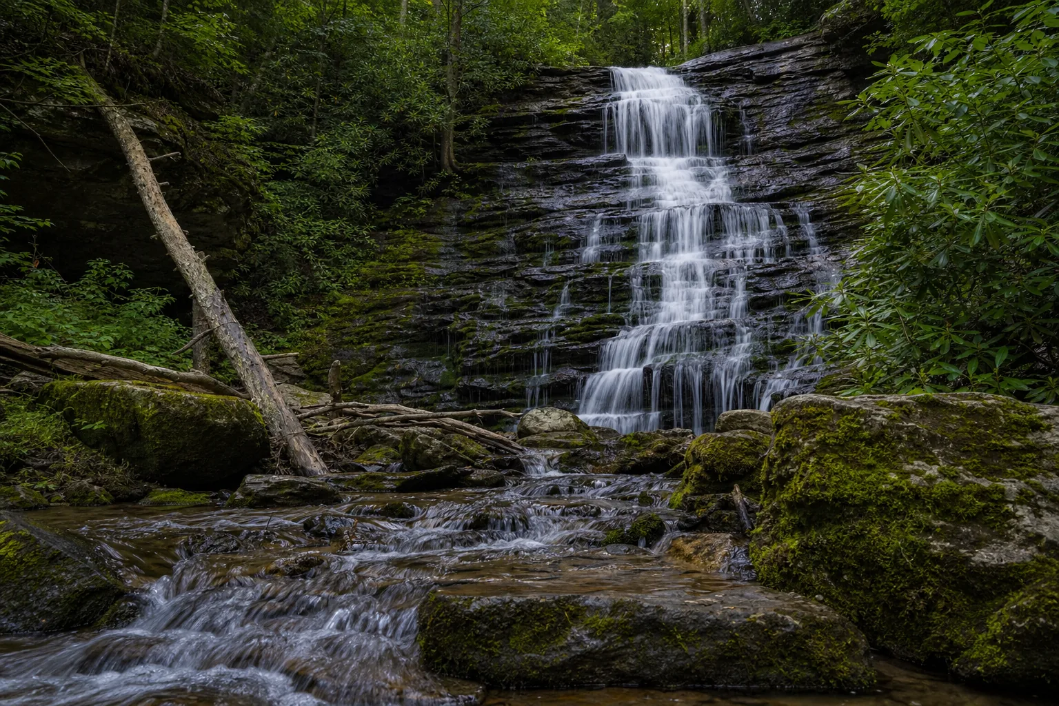 Issaqueena Falls base of issaqueena falls where cane creek lands on dark blue ridge gneiss and schist below the plunge