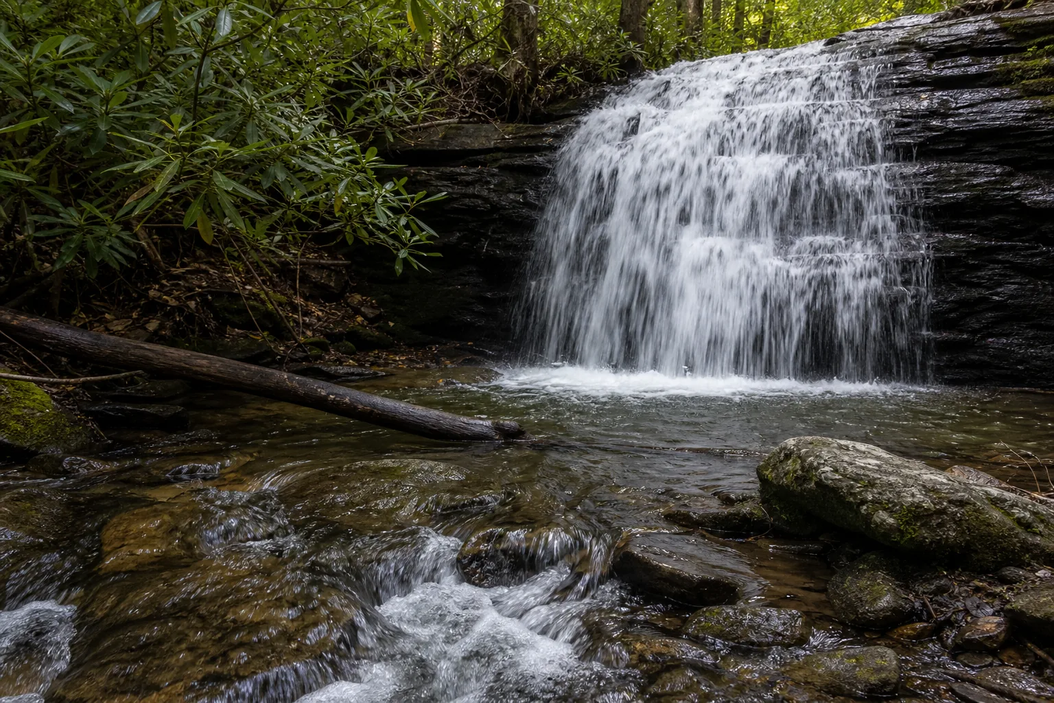 Long Creek Falls lower tier breaking across the gneiss ledge into the shallow plunge pool.