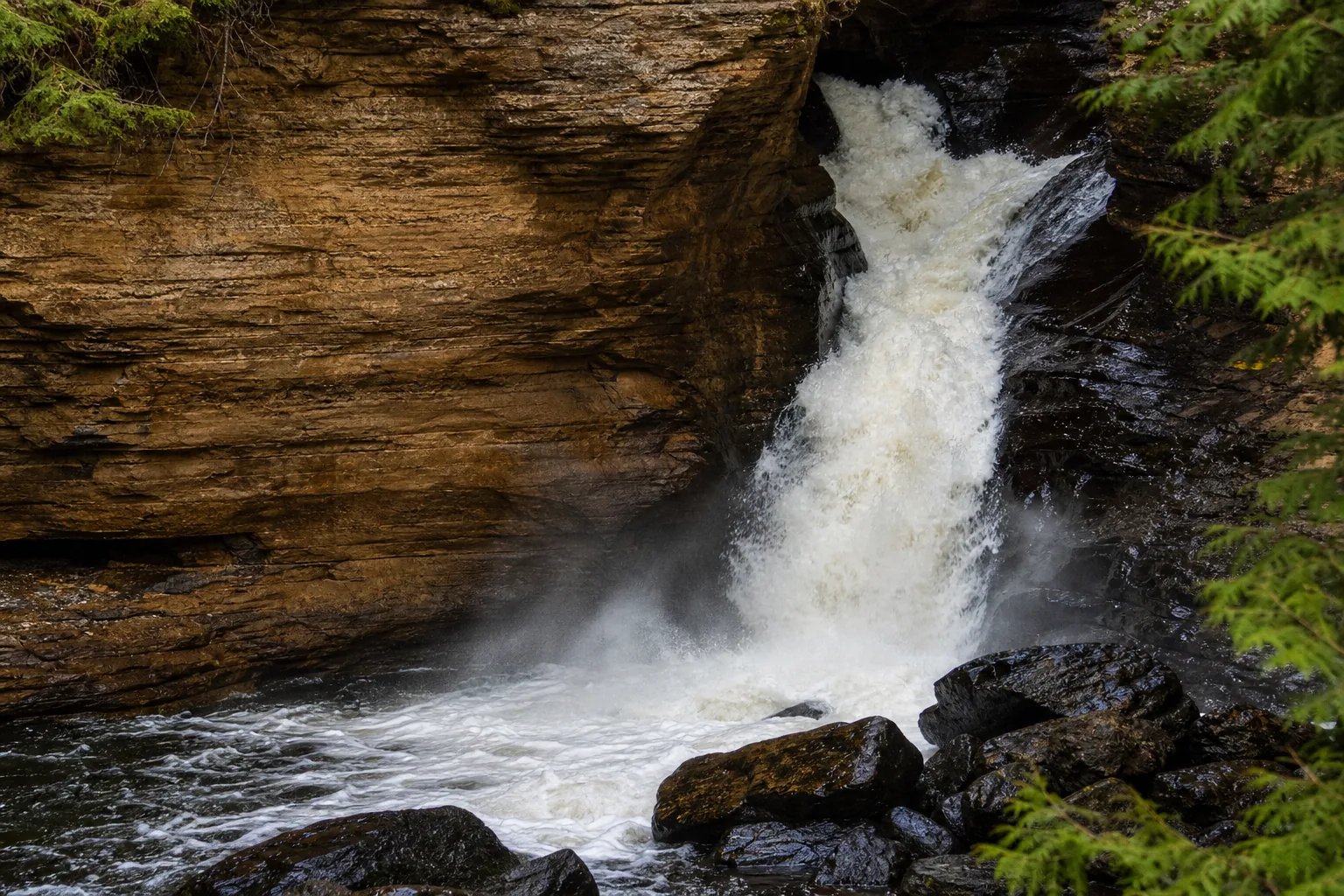 Detail of Miners Falls water over Cambrian Munising Formation sandstone