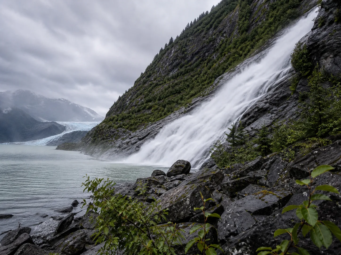 Side angle of Nugget Falls from the Mendenhall Lake gravel shoreline