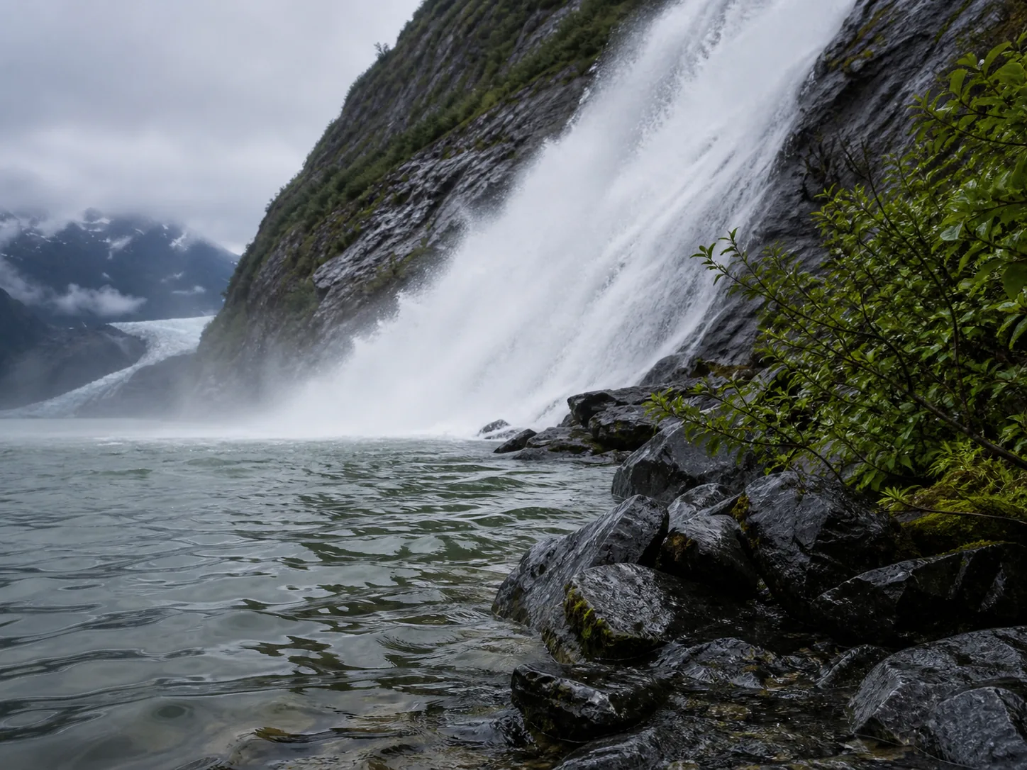 Wet rock and glacial water detail along the shoreline below Nugget Falls