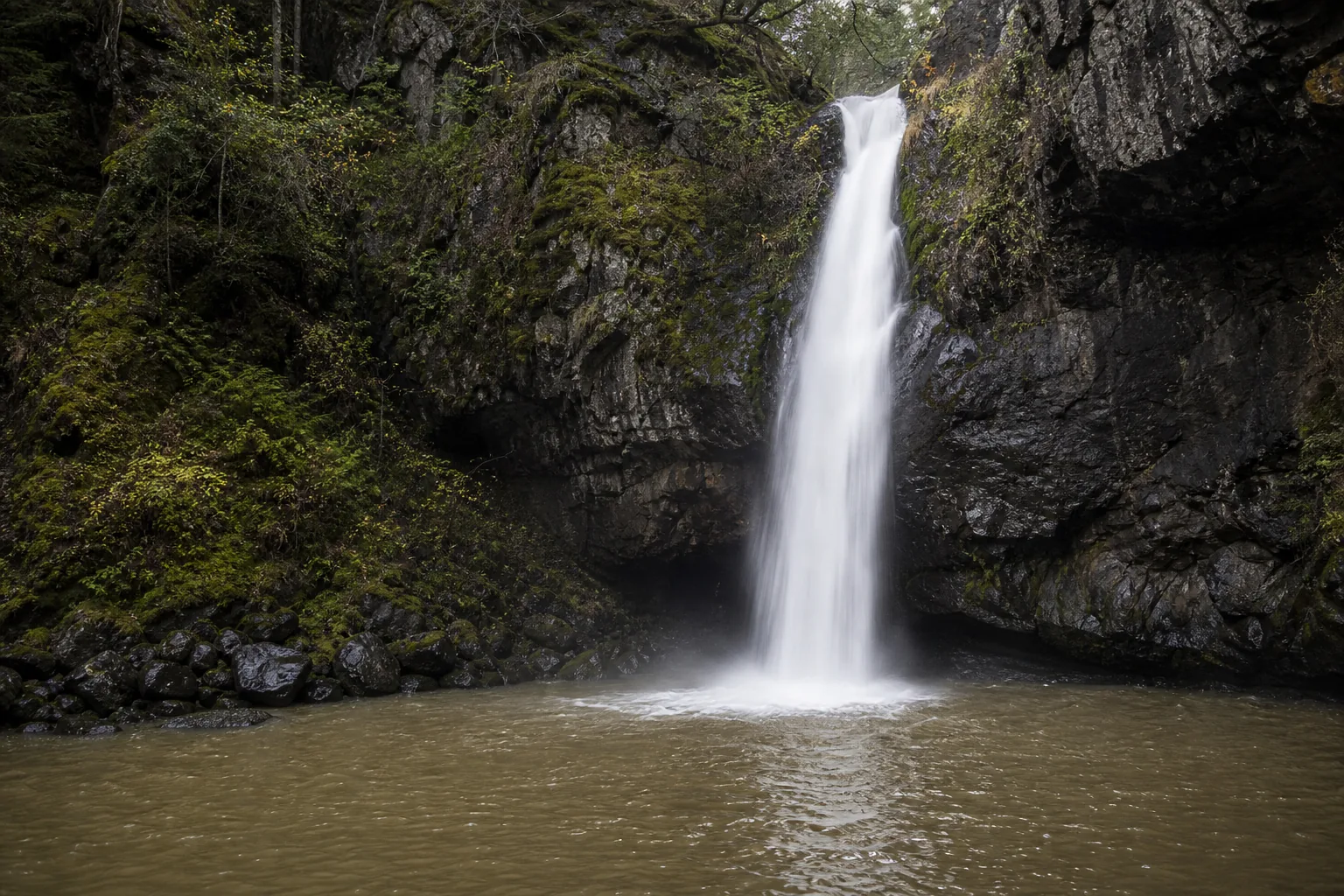 Potem Falls base of the falls and the spray line where summer swimmers stage