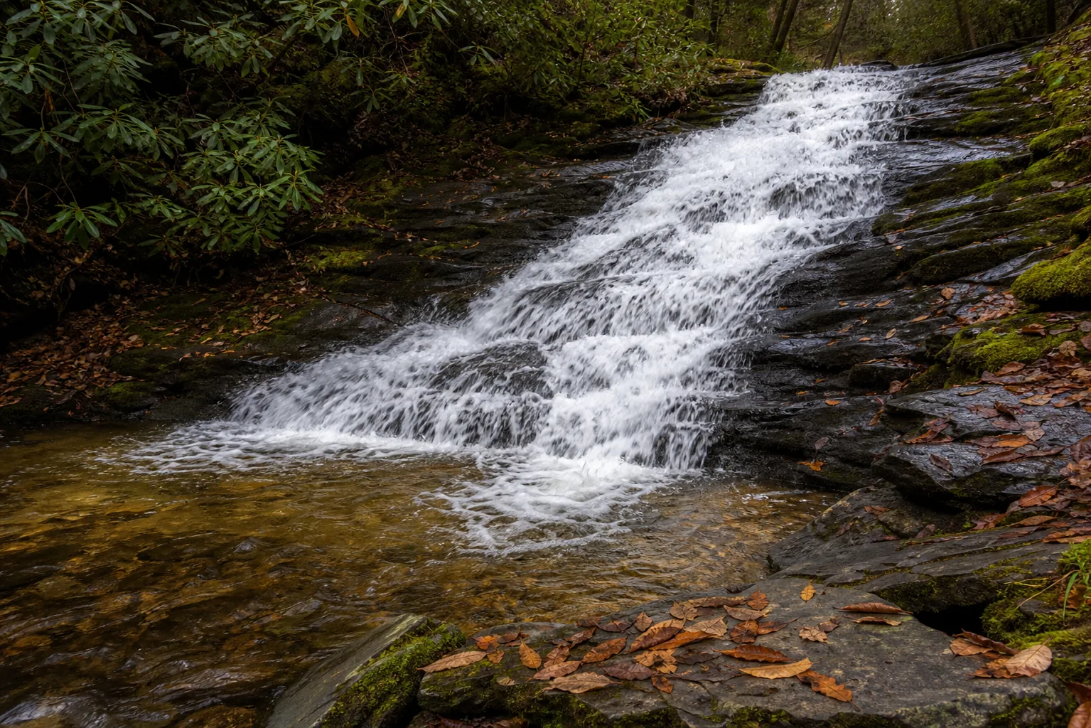 Roaring Fork Falls base of the cascade where the water regroups across the boulder pile