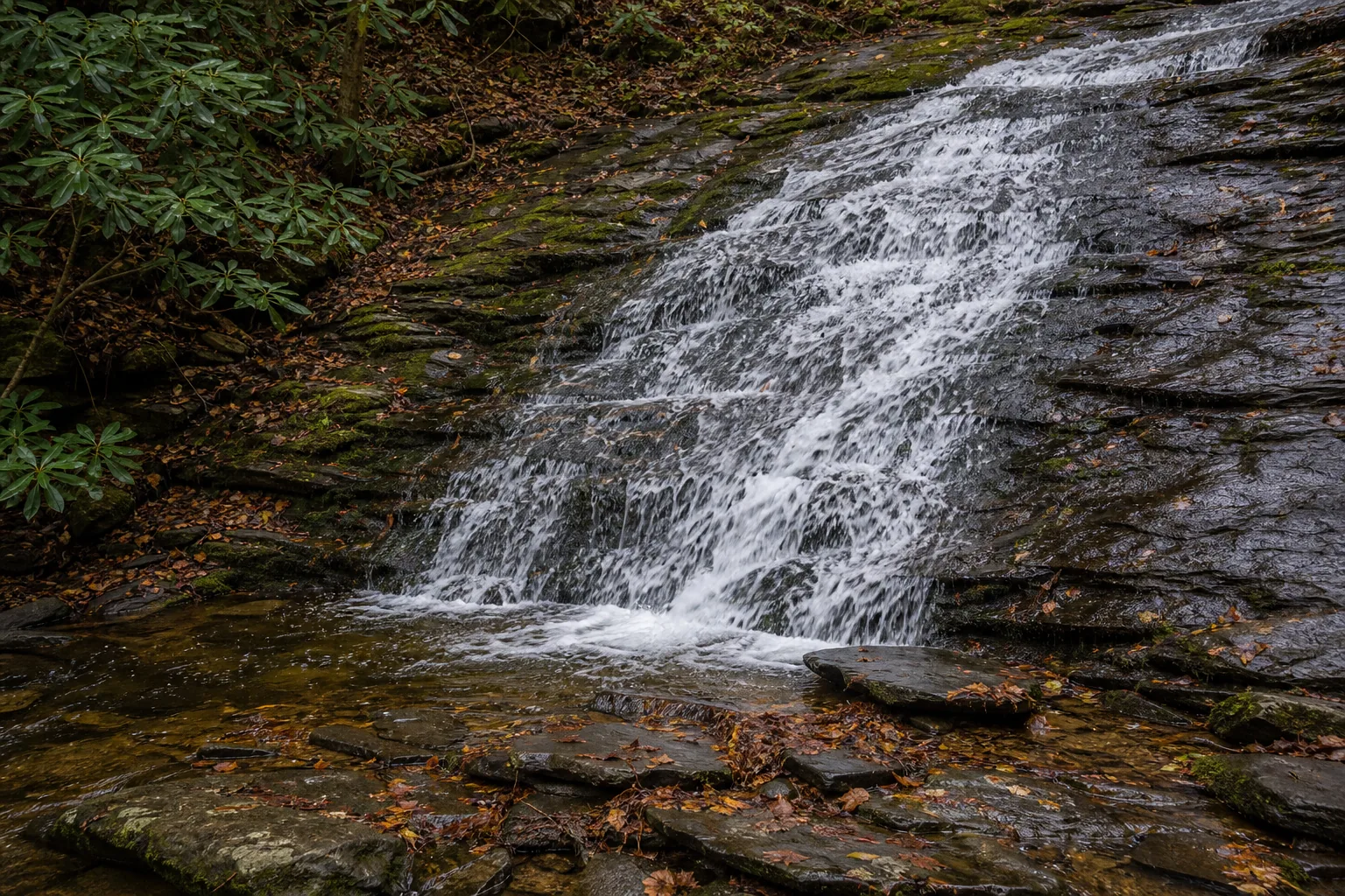 Roaring Fork Falls detail of the water threading the foliated gneiss ledges of the cascade